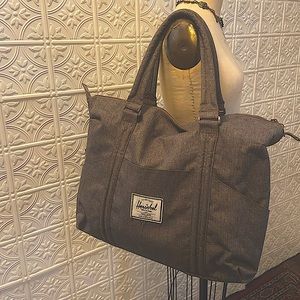 NWOT Gray Herschel duffle bag.